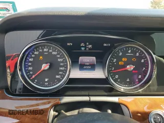 2019 Mercedes-Benz E 300 with VIN WDDZF4KB9KA520910, listed as a Copart auction lot 54697765 with 69,324 mi miles and Salvage title. Bid and sale history available at DreamBid. Image 9.