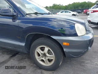 2004 Hyundai Santa Fe GLS with VIN KM8SC73D74U608244, listed as a IAAI auction lot 42142464 with 138,537 mi miles. Bid and sale history available at carsss.com. Image 13.