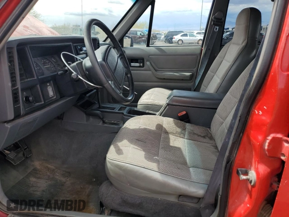 1996 Jeep Cherokee Sport with VIN 1J4FJ68S6TL213886, listed as a Copart auction lot 51462275 with 215,091 mi miles and Salvage title. Bid and sale history available at DreamBid. Image 7.