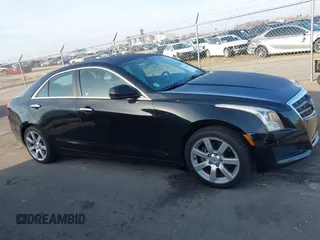 2014 Cadillac ATS Standard RWD with VIN 1G6AA5RA7E0100973, listed as a IAAI auction lot 41795657 with 93,807 mi miles and . Bid and sale history available at DreamBid. Image 13.