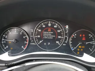 2021 Mazda 3 Preferred with VIN JM1BPBLL1M1340795, listed as a Copart auction lot 52627905 with 13,596 mi miles and Salvage title. Bid and sale history available at DreamBid. Image 9.