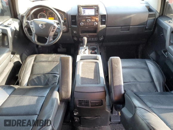 2013 Nissan Titan SV with VIN 1N6AA0EC9DN311176, listed as a Copart auction lot 79391214 with 99,085 mi miles and Salvage title. Bid and sale history available at DreamBid. Image 8.