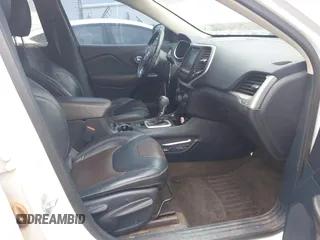 2016 Jeep Cherokee Limited z VIN 1C4PJMDS6GW182082, wystawiony jako IAAI lot #41943408 z przebiegiem 141 796 mil mil oraz . Historia ofert i sprzedaży dostępna na DreamBid. Obrazek 5.