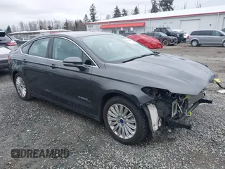 2015 Ford Fusion SE Hybrid with VIN 3FA6P0LU7FR220951, listed as a IAAI auction lot 41618495 with 61,218 mi miles. Bid and sale history available at carsss.com. Image 1.