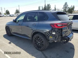 2021 BMW X5 xDrive40i with VIN 5UXCR6C06M9H65380, listed as a Copart auction lot 57445405 with 33,916 mi miles and Salvage title. Bid and sale history available at DreamBid. Image 2.