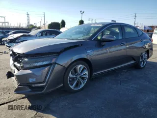 2021 Honda Clarity Plug-In Hybrid Touring with VIN JHMZC5F34MC001992, listed as a Copart auction lot 73437914 with 33,745 mi miles and Salvage Title. Bid and sale history available at carsss.com. Image 1.
