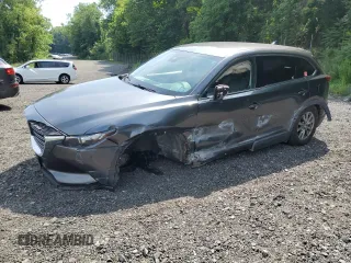 2019 Mazda CX-9 Touring с VIN JM3TCBCY5K0328655, выставлен на аукционе Copart как лот 64627255 с пробегом 54 658 миль миль и Списание • Salvage title. История ставок и продаж доступна на DreamBid. Изображение 1.