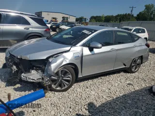 2018 Honda Clarity Touring z VIN JHMZC5F37JC004199, wystawiony jako Copart lot #64580085 z przebiegiem 21 341 mil mil oraz Czysty tytuł • Clean title. Historia ofert i sprzedaży dostępna na DreamBid. Obrazek 1.