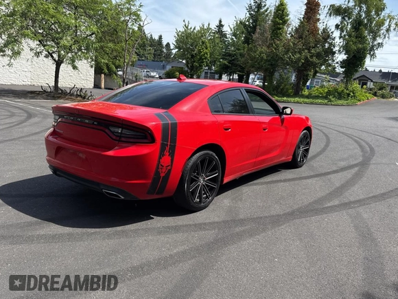 2020 Dodge Charger SXT z VIN 2C3CDXBG1LH121810, wystawiony jako Copart lot #62026425 z przebiegiem 66 439 mil mil oraz Czysty tytuł • Clean title. Historia ofert i sprzedaży dostępna na DreamBid. Obrazek 4.