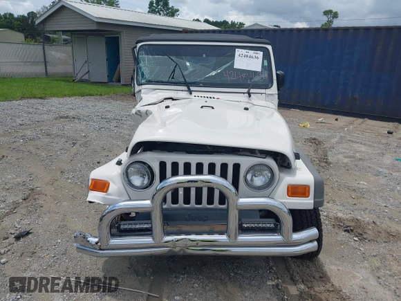 2005 Jeep Wrangler Unlimited with VIN 1J4FA44S65P368475, listed as a IAAI auction lot 42484636 with Not provided miles and . Bid and sale history available at DreamBid. Image 11.