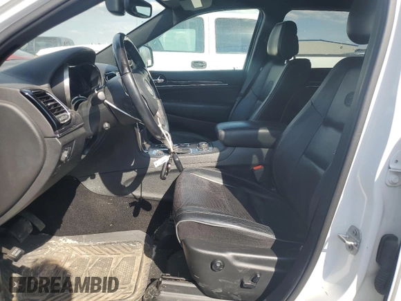 2020 Jeep Grand Cherokee Overland with VIN 1C4RJFCG4LC398526, listed as a Copart auction lot 54221205 with 122,046 mi miles and Salvage Title. Bid and sale history available at DreamBid. Image 7.
