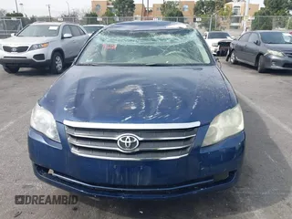 2006 Toyota Avalon XL z VIN 4T1BK36B76U148298, wystawiony jako IAAI lot #41687879 z przebiegiem Nie podano mil oraz . Historia ofert i sprzedaży dostępna na DreamBid. Obrazek 11.