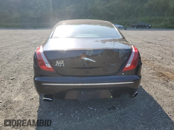 2012 Jaguar XJ Supersport z VIN SAJWA2JC4CMV21796, wystawiony jako Copart lot #66258395 z przebiegiem 122 190 mil mil oraz Czysty tytuł • Clean title. Historia ofert i sprzedaży dostępna na DreamBid. Obrazek 6.