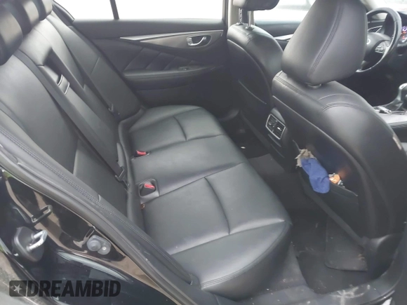 2015 Infiniti Q50 Premium z VIN JN1BV7ARXFM410177, wystawiony jako IAAI lot #41936999 z przebiegiem 129 123 mil mil oraz . Historia ofert i sprzedaży dostępna na DreamBid. Obrazek 8.