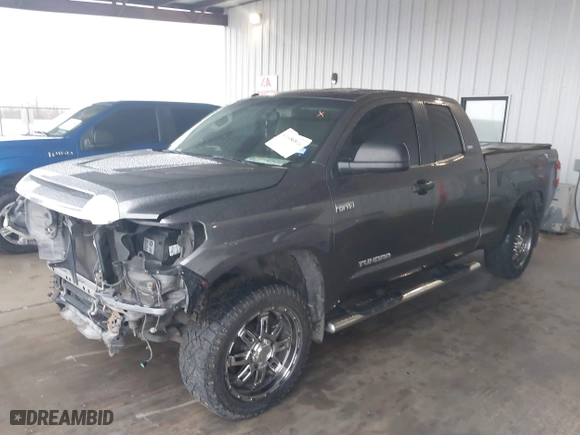 2014 Toyota Tundra 2WD Truck SR with VIN 5TFRY5F15EX166929, listed as a IAAI auction lot 41458810 with 142,152 mi miles. Bid and sale history available at carsss.com. Image 17.