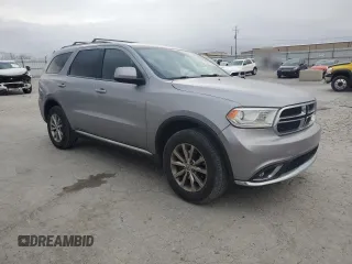 2017 Dodge Durango SXT with VIN 1C4RDJAG4HC871572, listed as a Copart auction lot 49011225 with 137,326 mi miles and Salvage title. Bid and sale history available at DreamBid. Image 4.