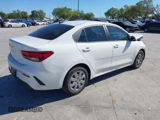 2023 Kia Rio LX with VIN 3KPA24AD4PE616342, listed as a IAAI auction lot 41848260 with 37,188 mi miles. Bid and sale history available at carsss.com. Image 4.