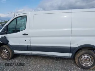 2016 Ford Transit Cargo with VIN 1FTYR1ZM2GKA38963, listed as a IAAI auction lot 42027447 with 70,659 mi miles and . Bid and sale history available at DreamBid. Image 14.