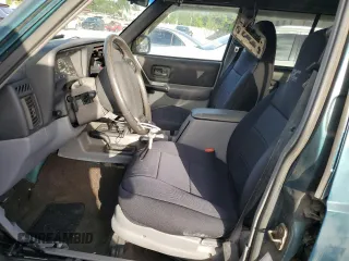 1998 Jeep Cherokee Country with VIN 1J4FT78S8XL520854, listed as a Copart auction lot 79304214 with 111,674 mi miles and Clean title. Bid and sale history available at DreamBid. Image 7.