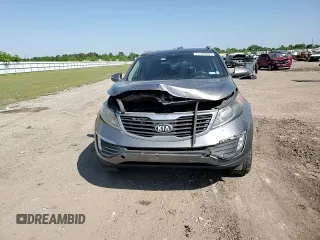 2013 Kia Sportage EX с VIN KNDPCCA20D7383698, выставлен на аукционе Copart как лот 52900065 с пробегом 168 222 миль миль и Списание • Salvage title. История ставок и продаж доступна на DreamBid. Изображение 12.