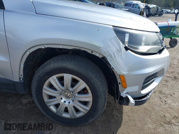 2012 Volkswagen Tiguan with VIN WVGCV7AX6CW589605, listed as a IAAI auction lot 41916090 with 123,223 mi miles and . Bid and sale history available at DreamBid. Image 12.