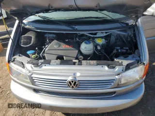 2000 Volkswagen EuroVan с VIN WV2MH4703YH013265, выставлен на аукционе Copart как лот 59003645 с пробегом Не указан миль и Списание • Salvage title. История ставок и продаж доступна на DreamBid. Изображение 12.