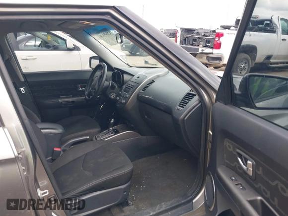 2012 Kia Soul + with VIN KNDJT2A65C7403493, listed as a IAAI auction lot 42095119 with 151,258 mi miles. Bid and sale history available at carsss.com. Image 5.