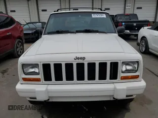 1997 Jeep Cherokee Country with VIN 1J4FJ78S9VL576899, listed as a Copart auction lot 82303584 with 335,746 mi miles and Salvage Title. Bid and sale history available at carsss.com. Image 5.