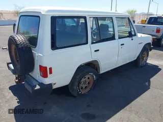 1990 Mitsubishi Montero z VIN JA4GJ31S0LJ009870, wystawiony jako IAAI lot #42192378 z przebiegiem 200 028 mil mil oraz . Historia ofert i sprzedaży dostępna na DreamBid. Obrazek 4.