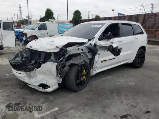2018 Jeep Grand Cherokee Trackhawk with VIN 1C4RJFN91JC293695, listed as a Copart auction lot 59031525 with 8,565 mi miles and Salvage title. Bid and sale history available at DreamBid. Image 1.