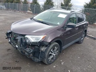 2016 Toyota RAV4 LE with VIN 2T3BFREV5GW437868, listed as a IAAI auction lot 41723004 with 142,793 mi miles. Bid and sale history available at carsss.com. Image 2.