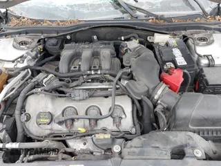 2012 Ford Fusion SPORT with VIN 3FAHP0DC7CR155450, listed as a IAAI auction lot 40651757 with 158,636 mi miles. Bid and sale history available at carsss.com. Image 10.