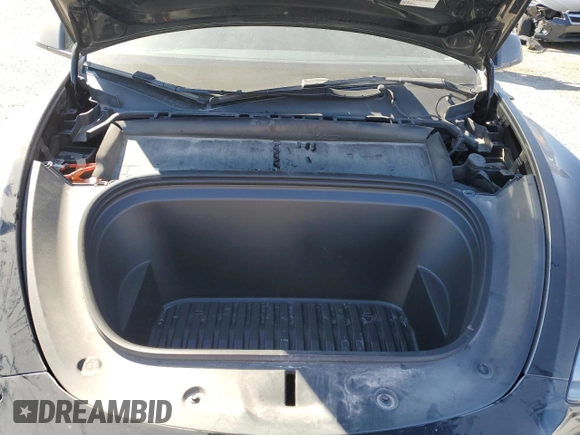 2023 Tesla Model Y Performance with VIN 7SAYGDEF7PF924355, listed as a Copart auction lot 47877055 with 64,663 mi miles and Salvage Title. Bid and sale history available at DreamBid. Image 14.
