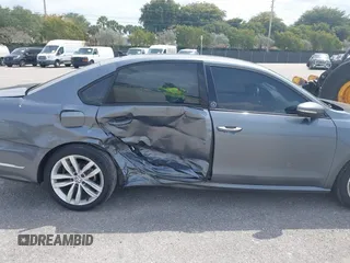 2019 Volkswagen Passat 2.0T Wolfsburg Edition with VIN 1VWLA7A35KC011084, listed as a IAAI auction lot 40385111 with 81,119 mi miles. Bid and sale history available at carsss.com. Image 6.