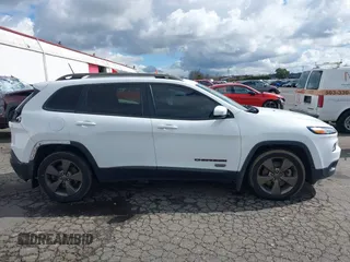 2017 Jeep Cherokee Latitude with VIN 1C4PJLCS6HW578672, listed as a IAAI auction lot 41794244 with 111,225 mi miles and . Bid and sale history available at DreamBid. Image 14.