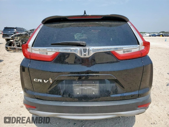 2019 Honda CR-V EX z VIN 7FARW1H52KE039158, wystawiony jako Copart lot #57277265 z przebiegiem 67 764 mil mil oraz Szkoda całkowita • Salvage title. Historia ofert i sprzedaży dostępna na DreamBid. Obrazek 6.