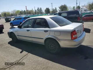 2003 Mazda Protege DX with VIN JM1BJ225730217866, listed as a Copart auction lot 53854075 with 105,782 mi miles and Salvage Title. Bid and sale history available at DreamBid. Image 2.