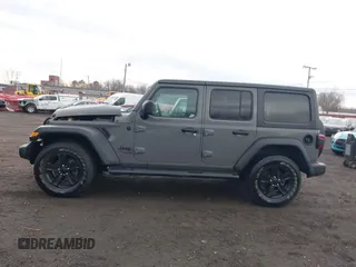 2021 Jeep Wrangler Unlimited Sport S with VIN 1C4HJXDG5MW614688, listed as a IAAI auction lot 41678964 with 89,309 mi miles. Bid and sale history available at carsss.com. Image 14.