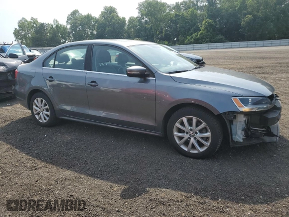 2014 Volkswagen Jetta SE z VIN 3VWD17AJ8EM405443, wystawiony jako Copart lot #59843445 z przebiegiem 156 331 mil mil oraz Szkoda całkowita • Salvage title. Historia ofert i sprzedaży dostępna na DreamBid. Obrazek 4.