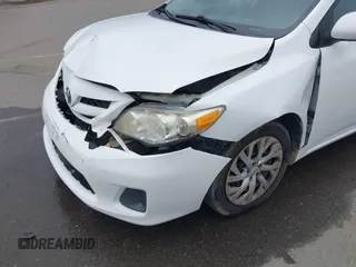 2011 Toyota Corolla L with VIN 2T1BU4EE6BC638383, listed as a IAAI auction lot 41934082 with 130,889 mi miles. Bid and sale history available at carsss.com. Image 17.