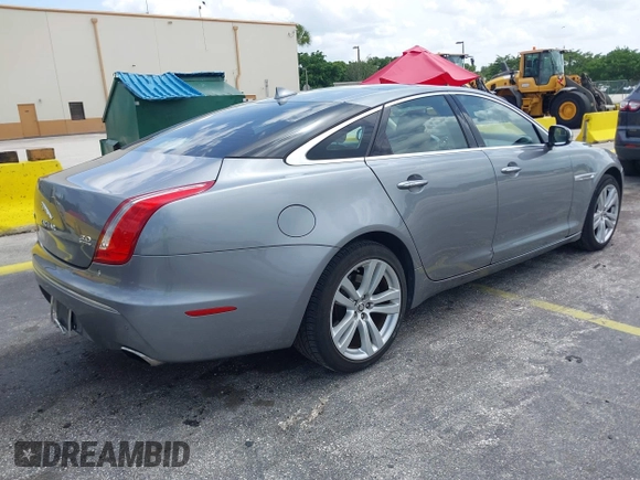 2013 Jaguar XJ with VIN SAJWJ1CD4D8V46305, listed as a IAAI auction lot 42637329 with 101,532 mi miles and . Bid and sale history available at DreamBid. Image 4.