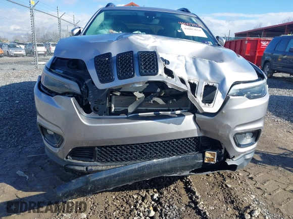 2019 Jeep Cherokee Latitude Plus with VIN 1C4PJMLB0KD320947, listed as a IAAI auction lot 41225801 with 64,537 mi miles and . Bid and sale history available at DreamBid. Image 6.