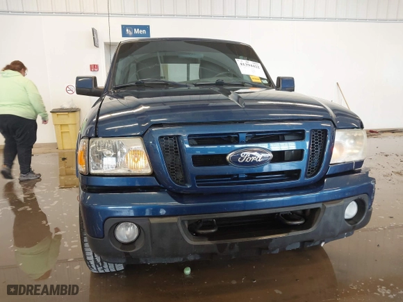 2011 Ford Ranger XLT with VIN 1FTLR4FE3BPA52049, listed as a IAAI auction lot 41394422 with 112,080 mi miles. Bid and sale history available at carsss.com. Image 12.