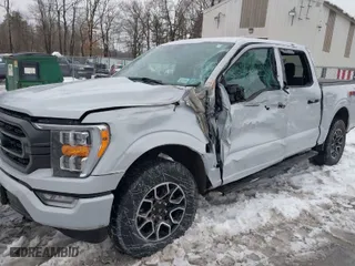 2021 Ford F-150 XL with VIN 1FTFW1E55MKD88680, listed as a IAAI auction lot 41552031 with 62,019 mi miles. Bid and sale history available at carsss.com. Image 6.