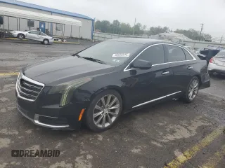 2018 Cadillac XTS Livery z VIN 2G61U5S31J9126777, wystawiony jako Copart lot #56658545 z przebiegiem 134 414 mil mil oraz Szkoda całkowita • Salvage title. Historia ofert i sprzedaży dostępna na DreamBid. Obrazek 1.