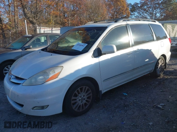 2009 Toyota Sienna XLE with VIN 5TDZK22C69S241205, listed as a IAAI auction lot 40980902 with 250,335 mi miles and . Bid and sale history available at DreamBid. Image 2.