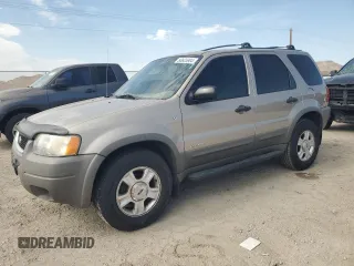 2001 Ford Escape XLT with VIN 1FMCU03131KB27591, listed as a Copart auction lot 66605904 with 167,094 mi miles and Salvage Title. Bid and sale history available at carsss.com. Image 1.