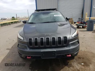 2014 Jeep Cherokee Trailhawk with VIN 1C4PJMBS6EW140981, listed as a Copart auction lot 58260325 with 97,036 mi miles and Salvage title. Bid and sale history available at DreamBid. Image 5.