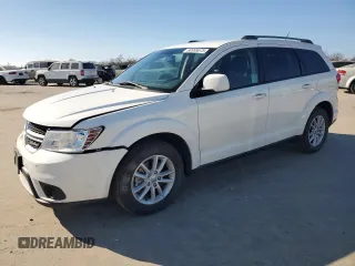 2017 Dodge Journey SXT with VIN 3C4PDCBB8HT675449, listed as a Copart auction lot 88999075 with 105,765 mi miles and Salvage Title. Bid and sale history available at DreamBid. Image 1.