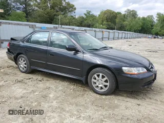 2002 Honda Accord SE z VIN JHMCG56742C020214, wystawiony jako Copart lot #56098805 z przebiegiem 256 147 mil mil oraz Szkoda całkowita • Salvage title. Historia ofert i sprzedaży dostępna na DreamBid. Obrazek 4.